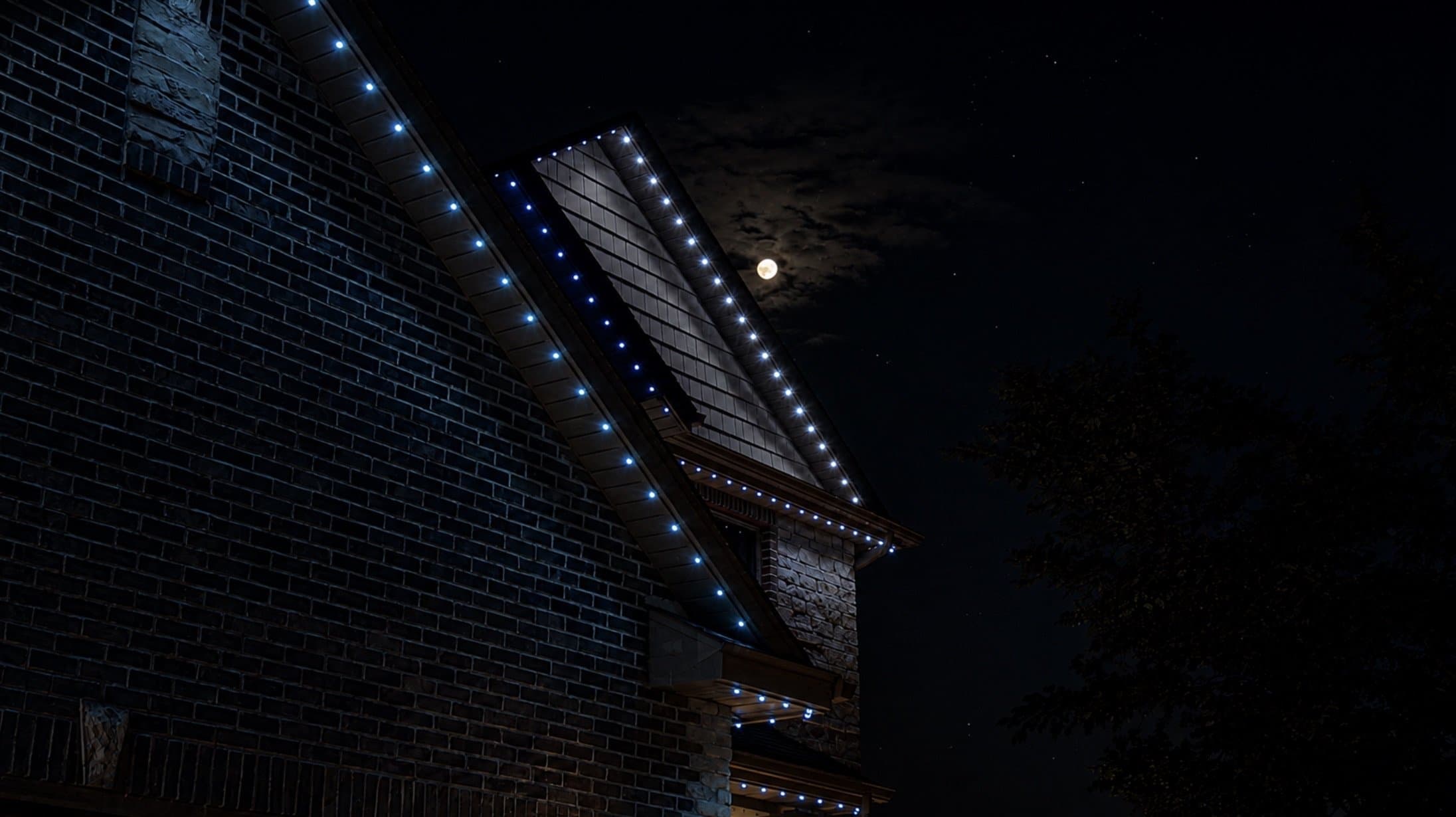 Close-up of a discreet permanent LED channel tucked under a roofline
